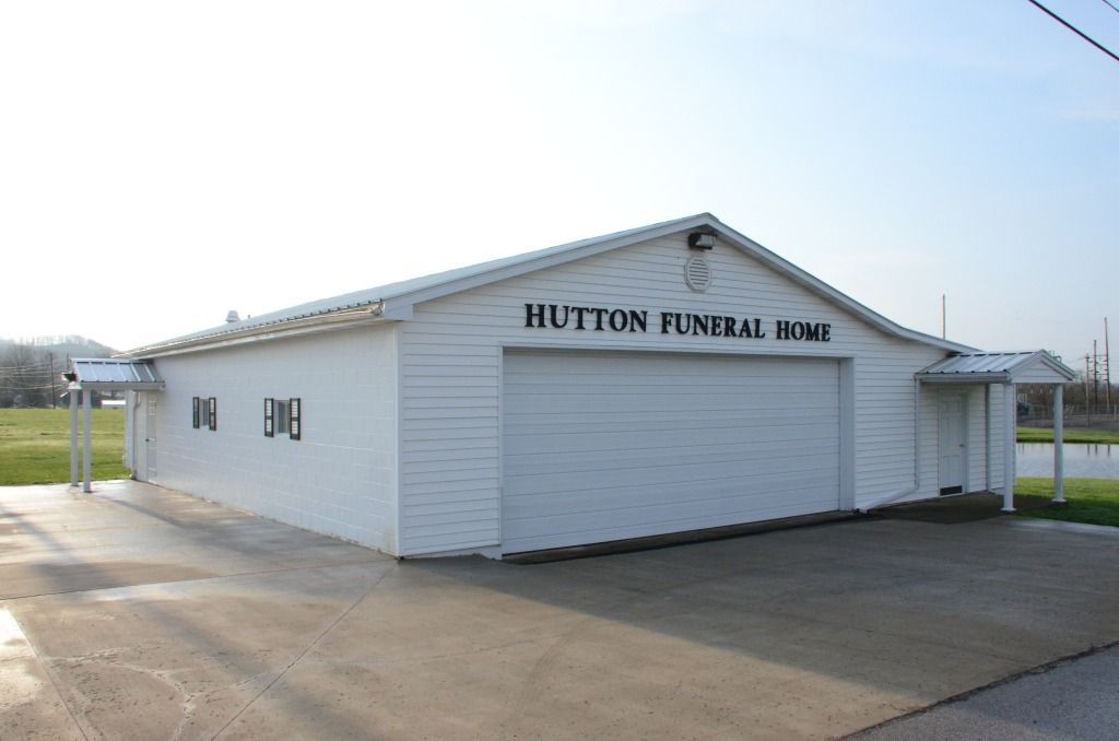 garage with hutton funeral home on it