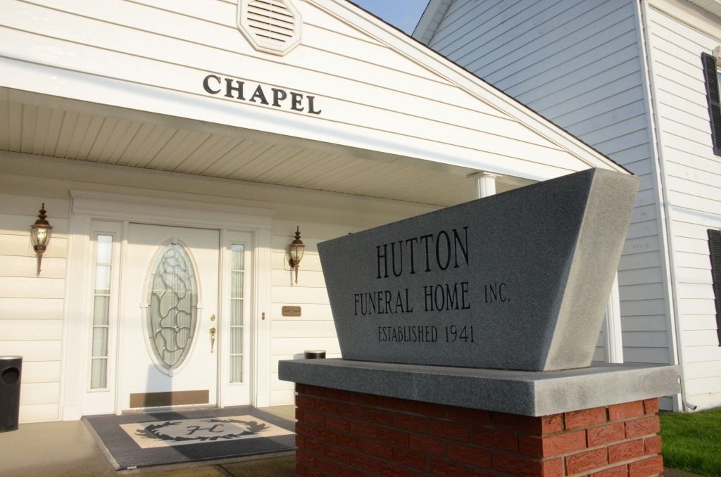 photo of funeral home and sign