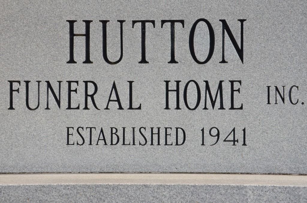 headstone that reads hutton funeral home inc est. 1941