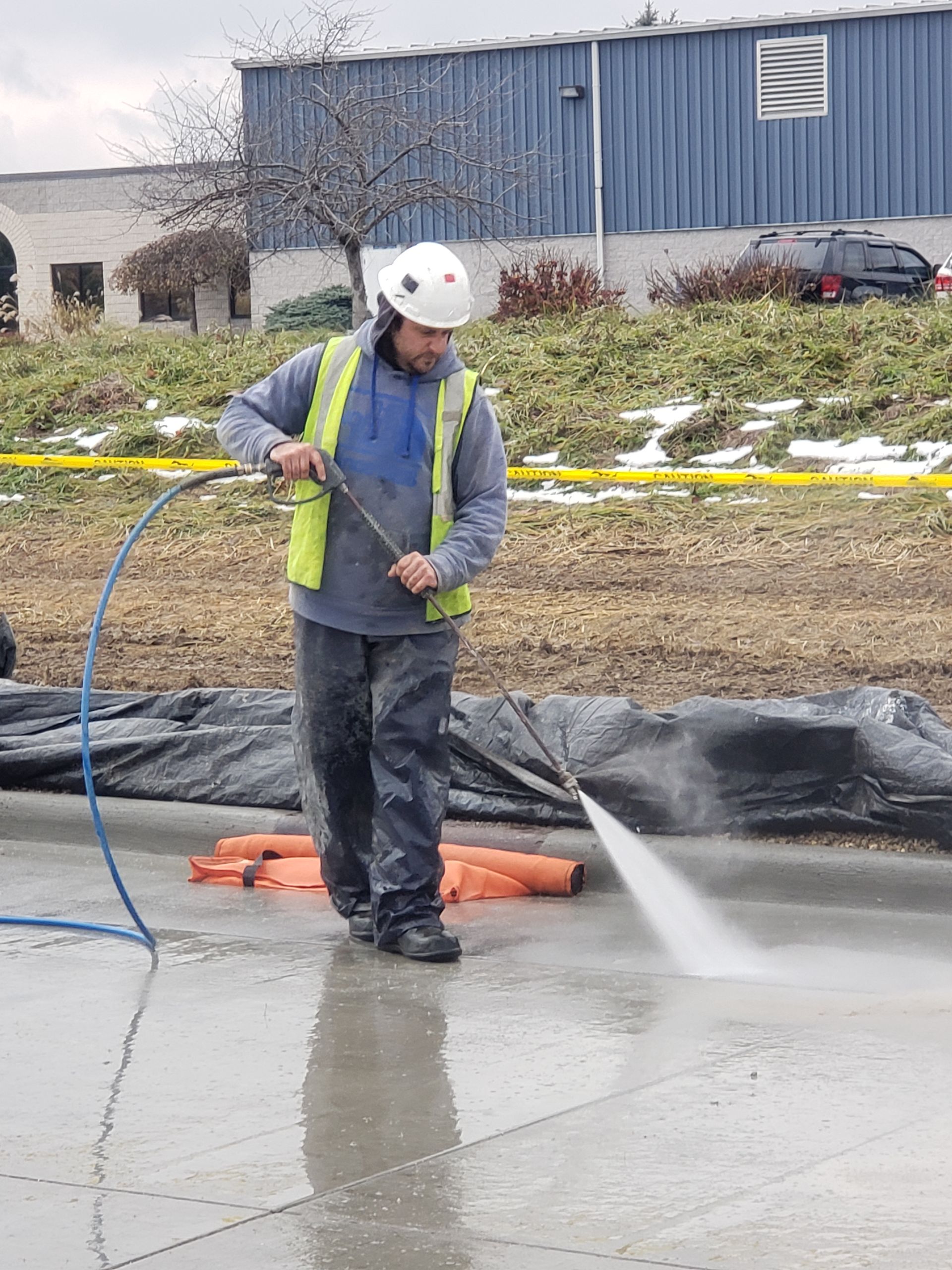 Powerwashing concrete preparation for caulking epoxy sealant