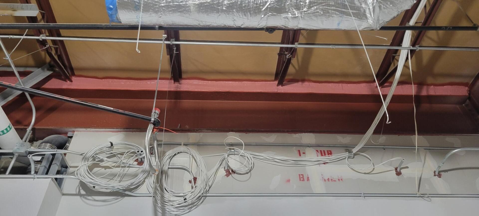 Firestopping applied to a firewall inside of a commercial building