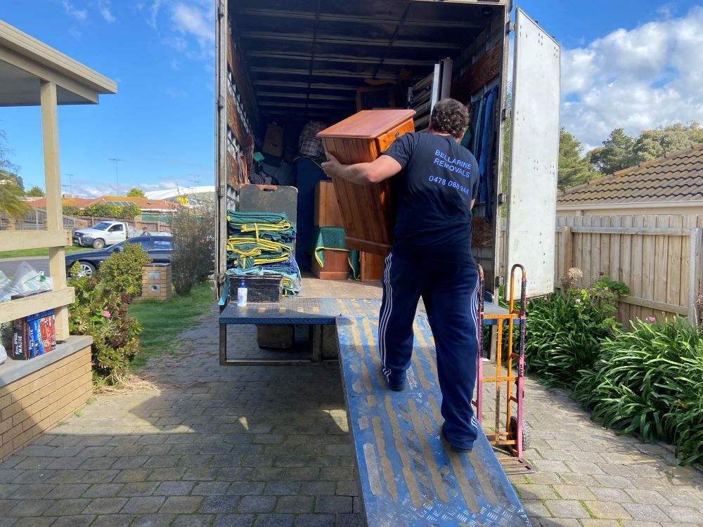 A Man Loading a Moving Truck