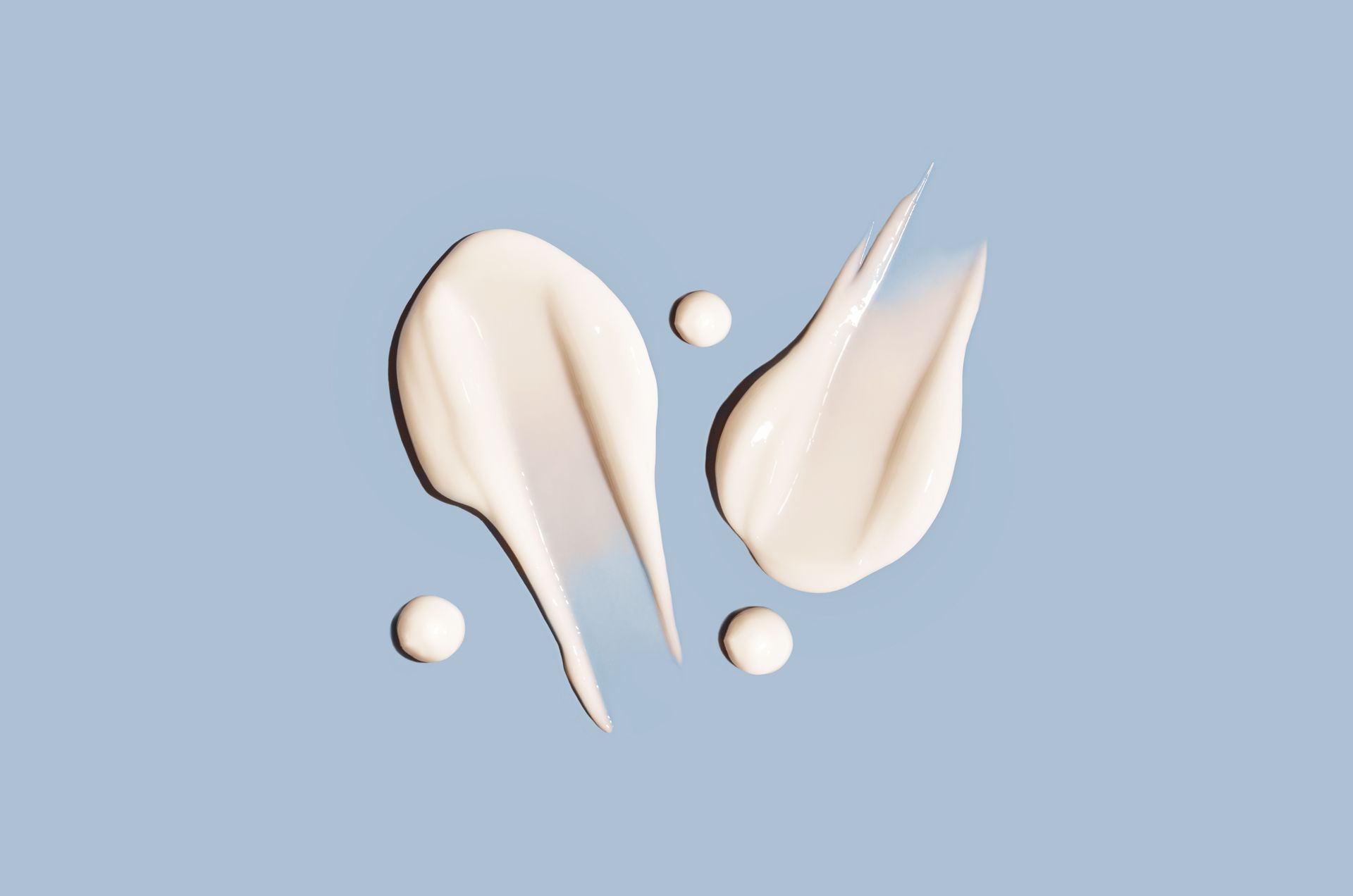 A close up of a white cream on a white surface.