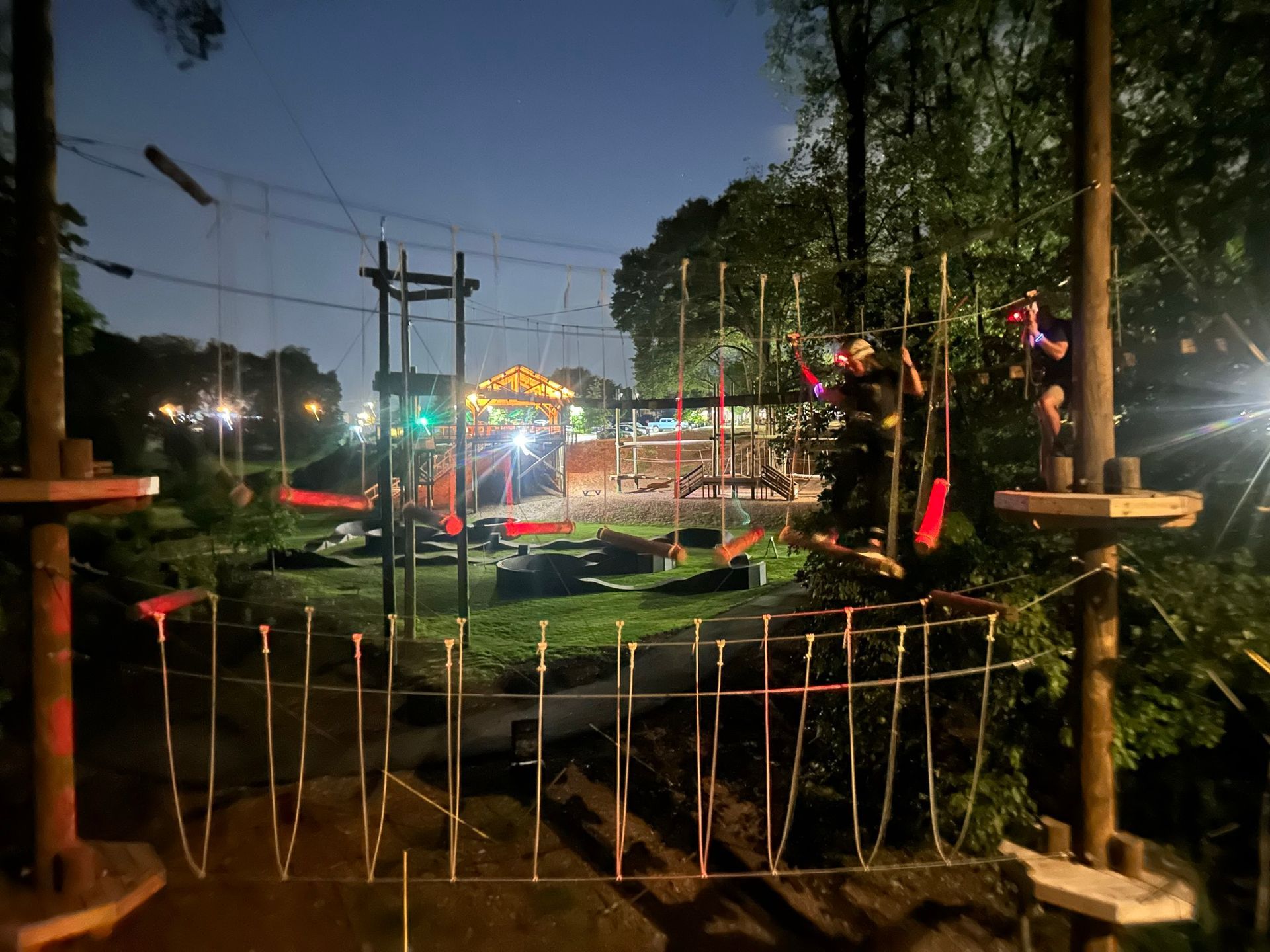 Guest wearing a head lamp and glow sticks on a Twilight Trip