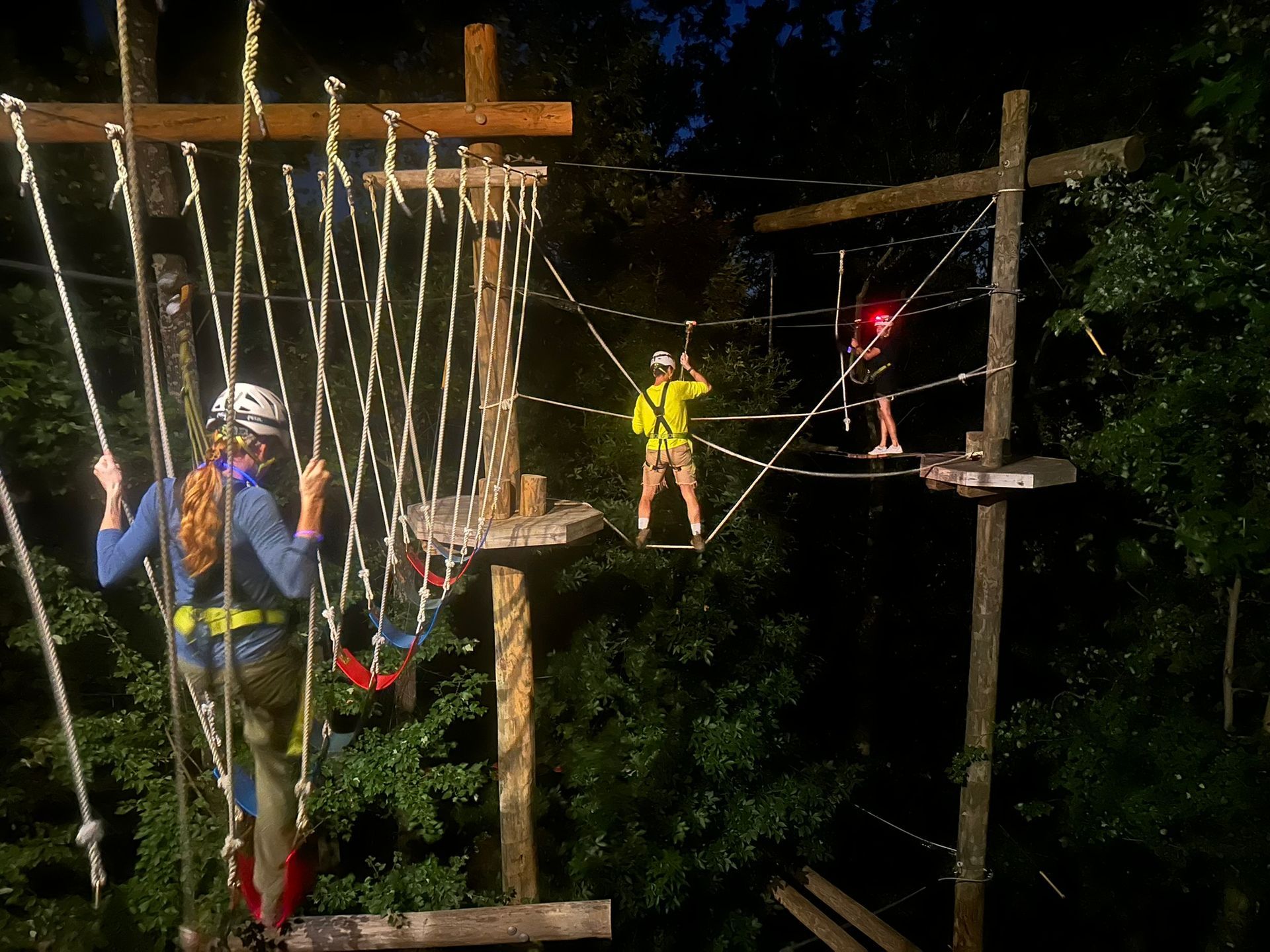 Climber on the Flying Rabbit Adventures course during a Twilight Trip