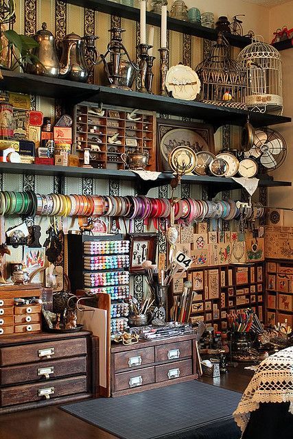 A room filled with lots of objects and shelves.