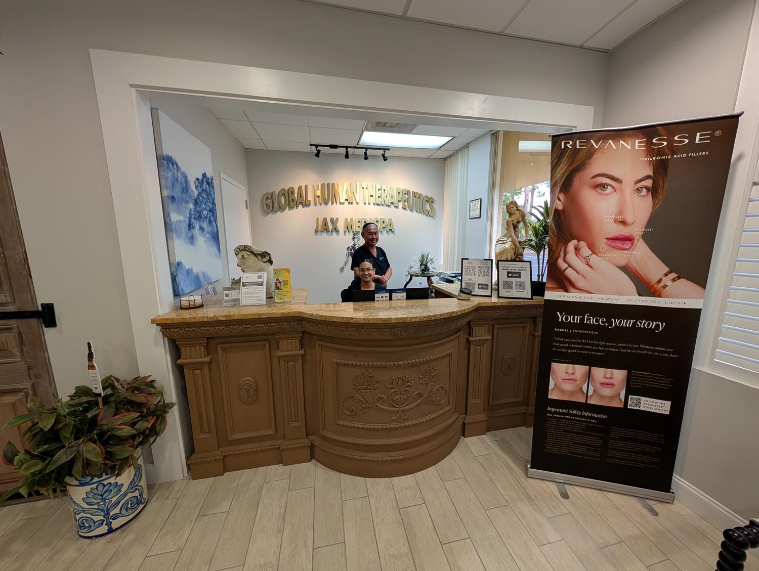 Reception desk in a bright spa lobby with skincare posters and a plant