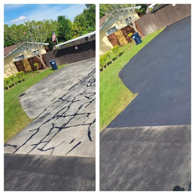 Two men are spraying asphalt on a driveway.
