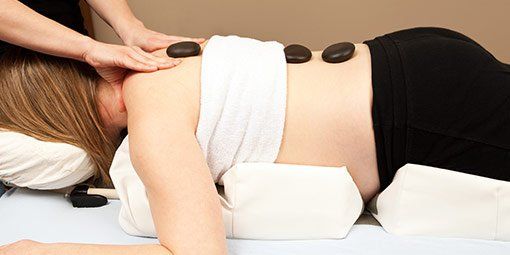 Hot Stone Massage — Elko, MN — Treasured Birth LLC Hot Stone Massage — Elko, MN — Treasured Birth LLC