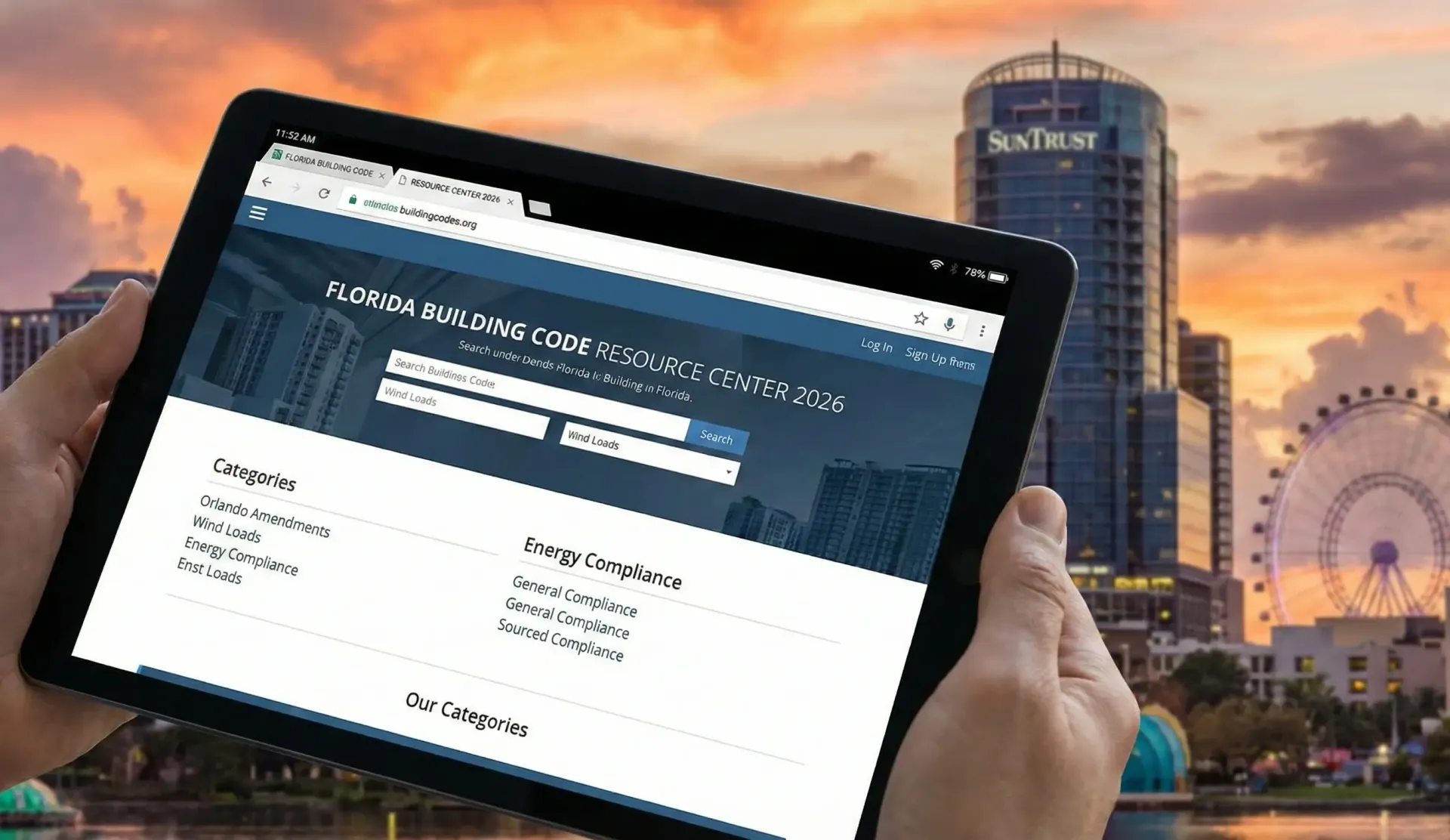 Tablet showing a Florida building code resource center with the Orlando skyline behind it