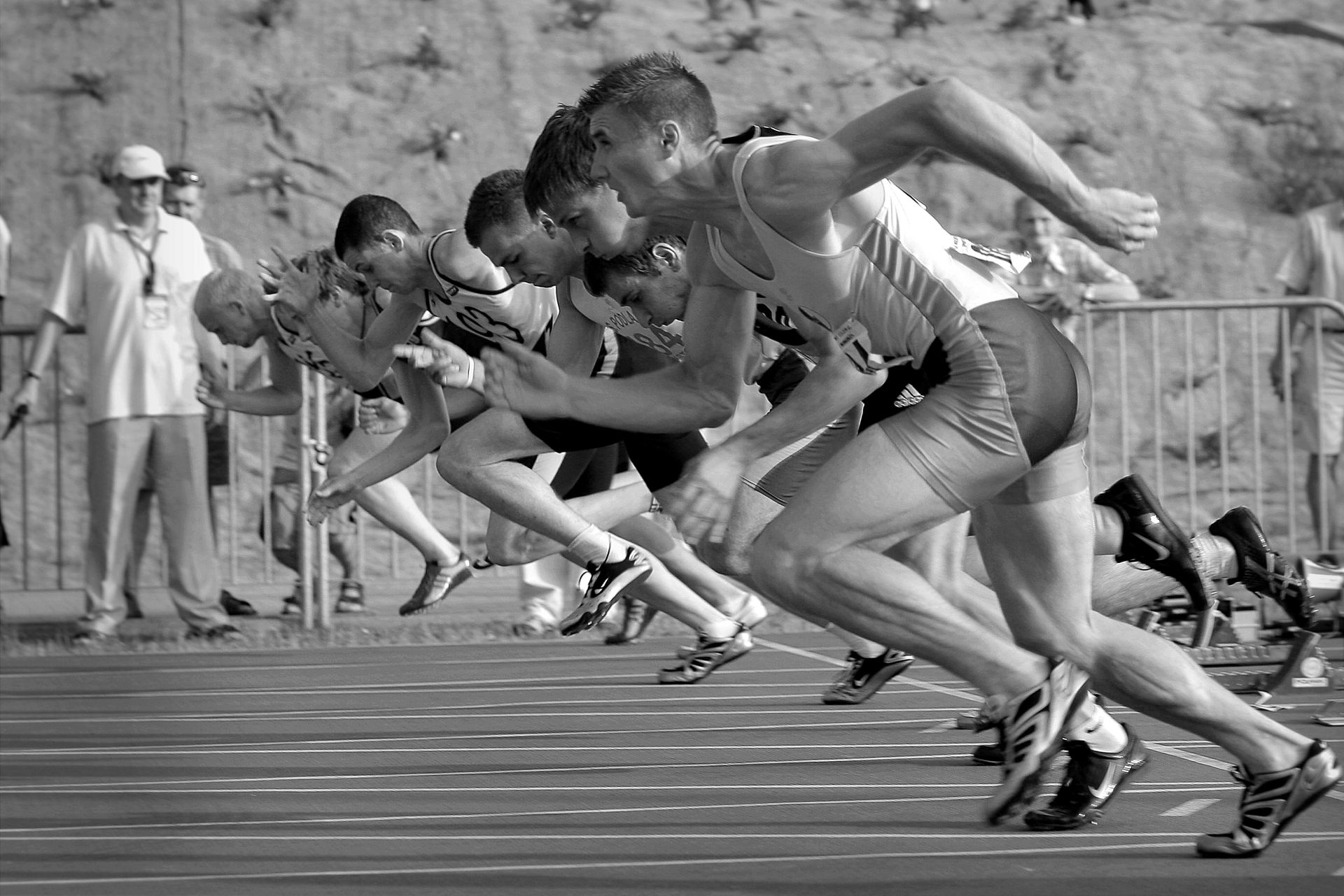 Runners at the starting line, illustrating website speed optimization