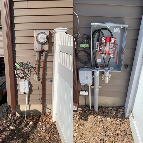 Electrical components on a house before and after an upgrade. Metal boxes, wires, meter, near a fence.