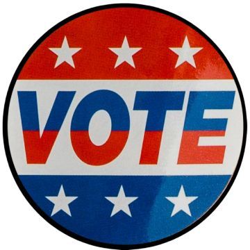 A round, red, white, and blue voting sticker with the word