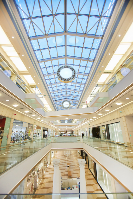 Looking up at the ceiling of a large shopping mall.