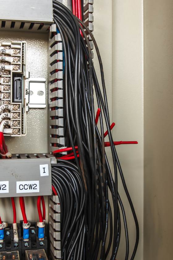 A bunch of wires are connected to a box with the number 1 on it