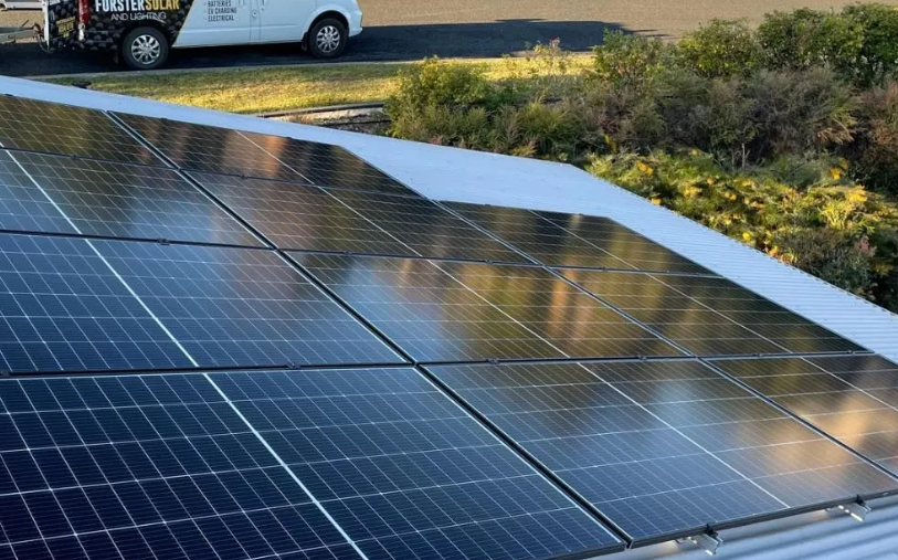 A Solar Panel On A Roof With A Blue Sky In The Background — Forster Solar and Lighting In Tuncurry, NSW