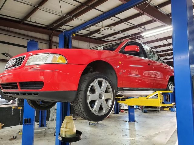 Car Lifted in Shop Garage | EuroSense