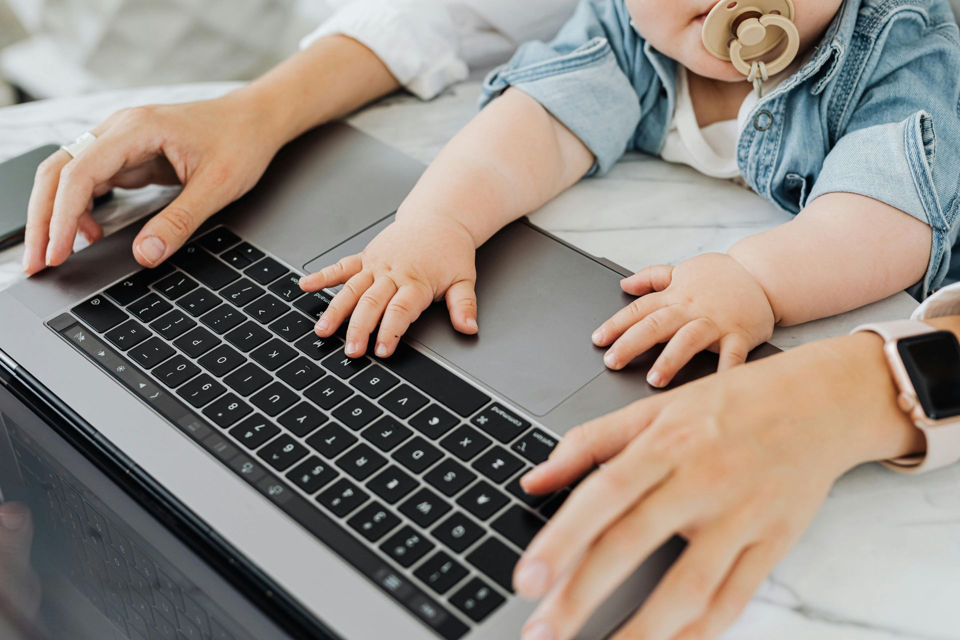 image of mom and baby at computer