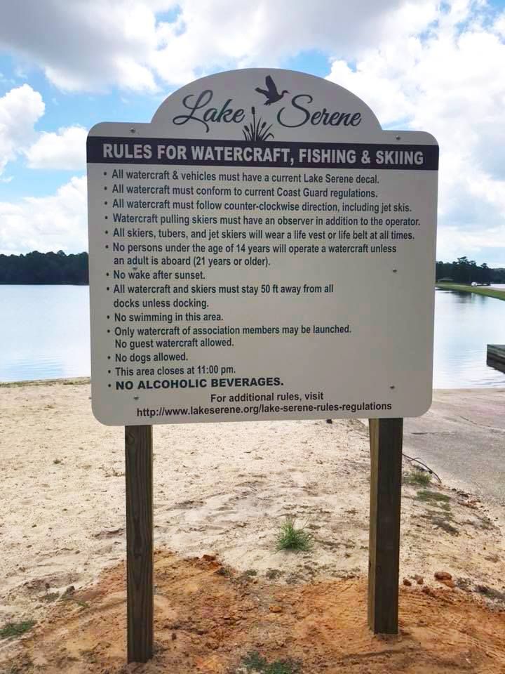 A white sign titled 