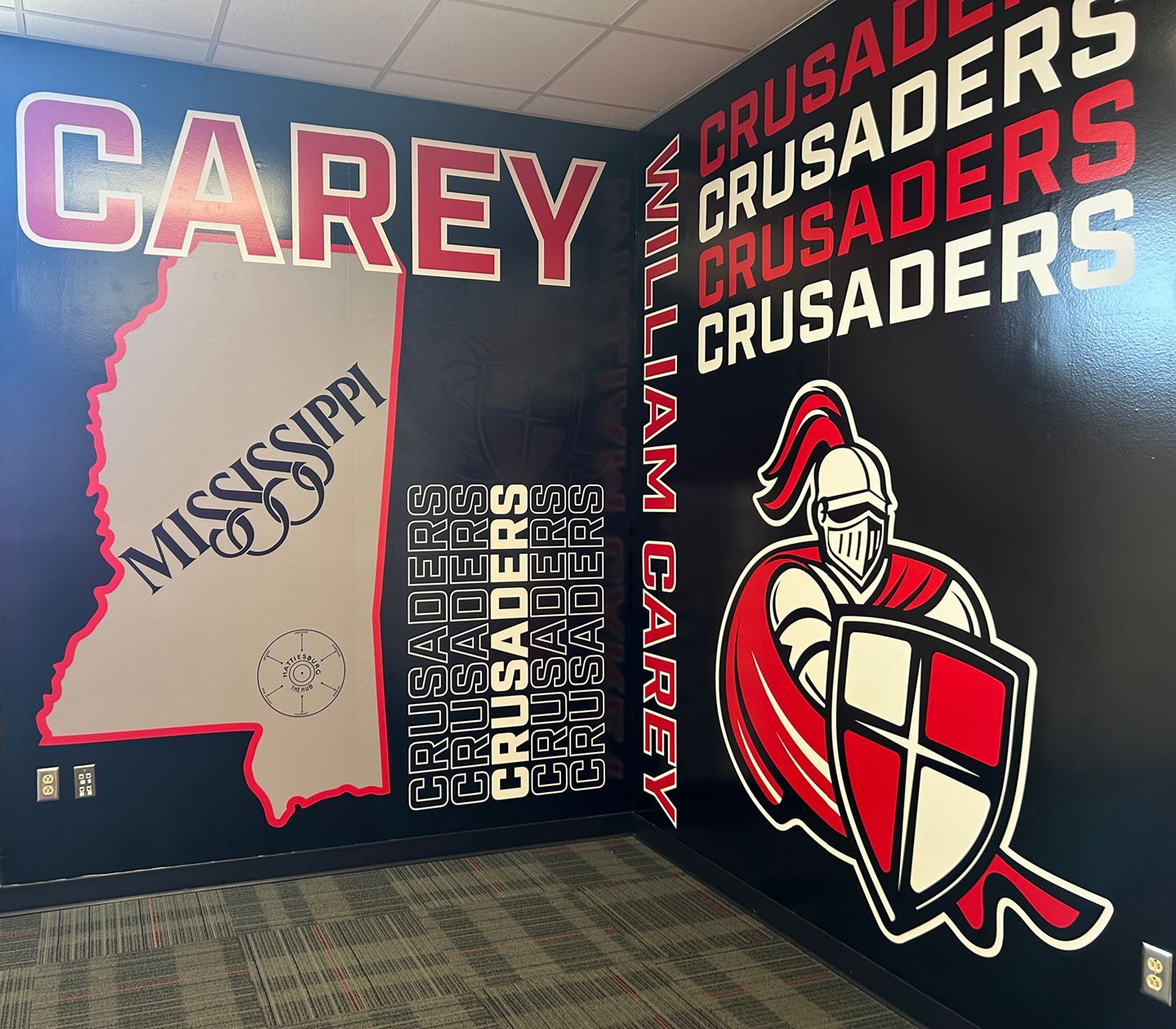 A corner mural features the text 