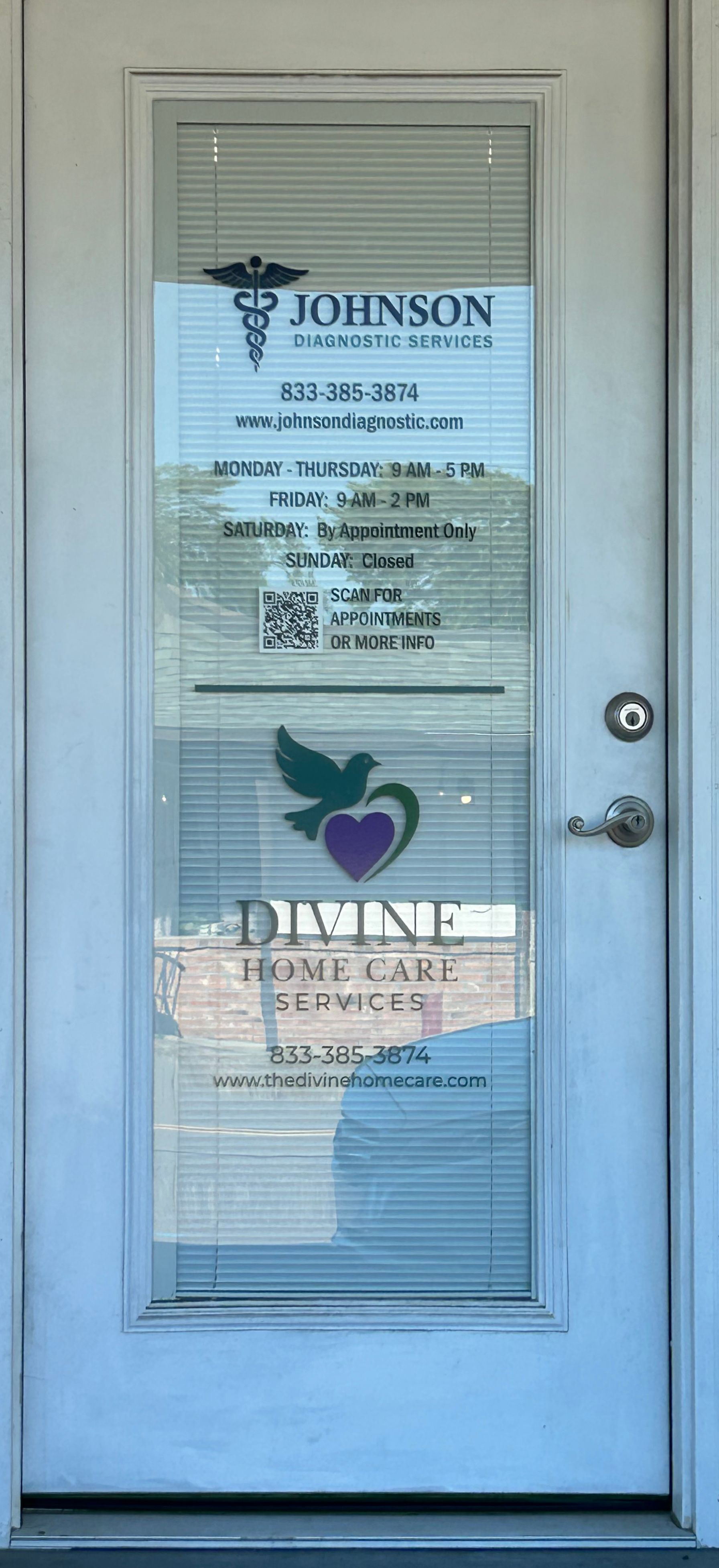 White door with vinyl signage for Johnson Medical Services and Divine Home Care, including phone numbers and logos.