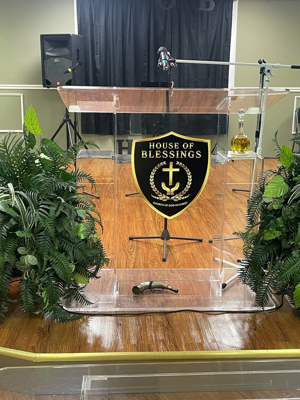 A clear acrylic podium with a 