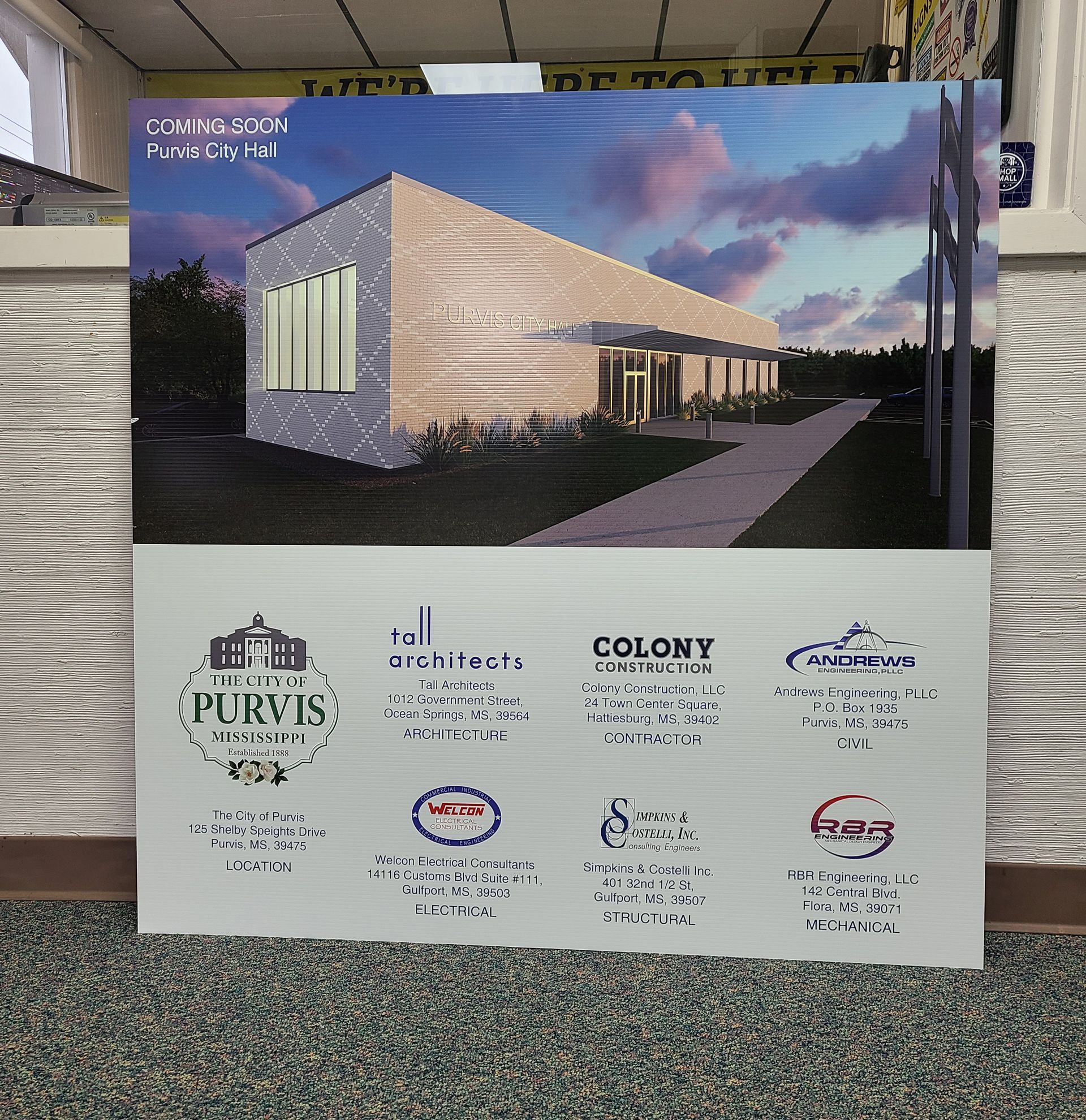 A rendering of a new building project for the City of Purvis, Mississippi, with project partner logos displayed below.