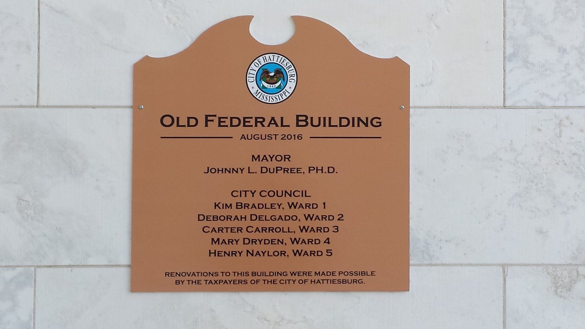 A plaque for the Old Federal Building in Hattiesburg, Mississippi, listing the mayor and city council members.