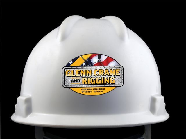 A white construction hard hat featuring a branded 