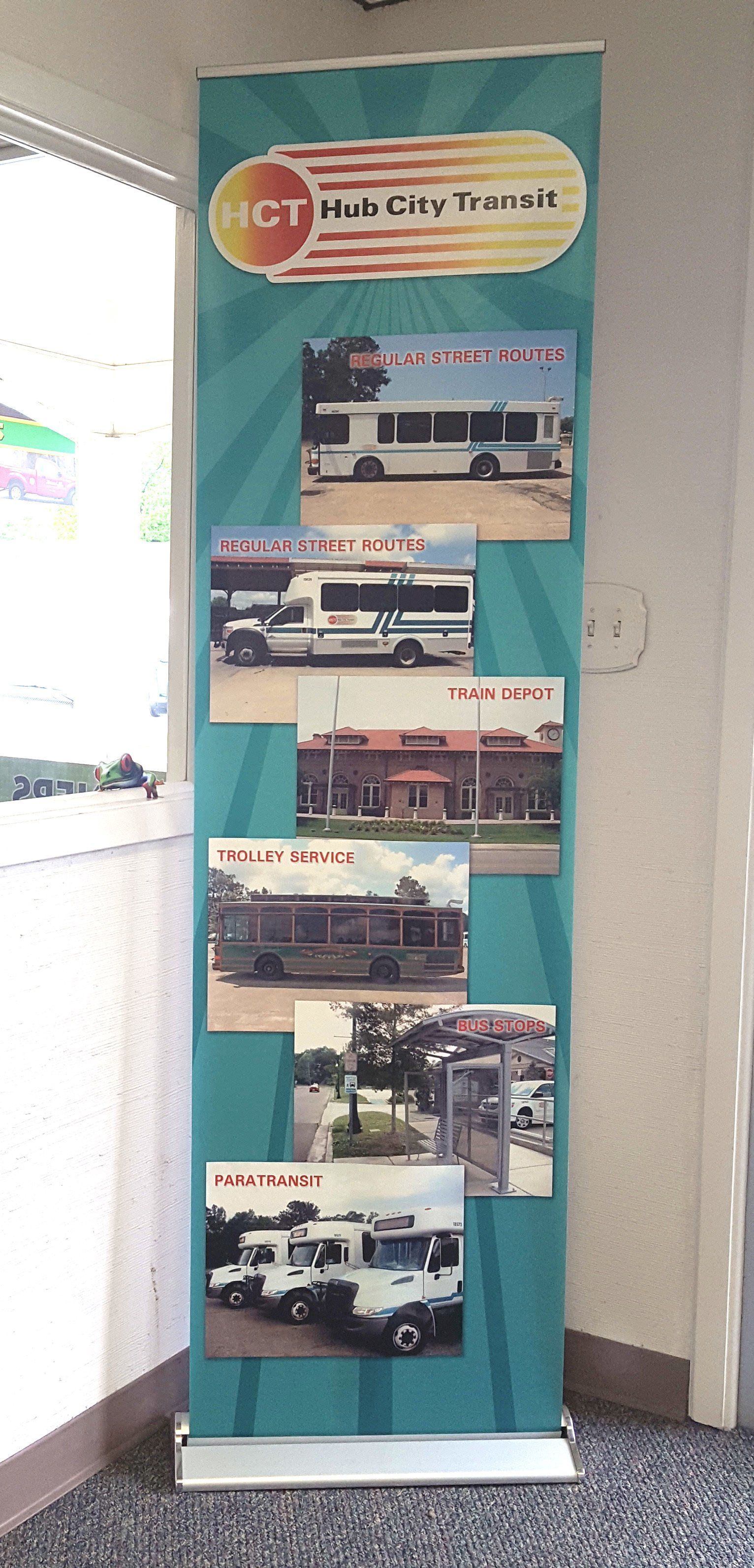 A vertical teal banner for Hill City Transit featuring photos of buses, a transit center, and a fleet of vehicles.