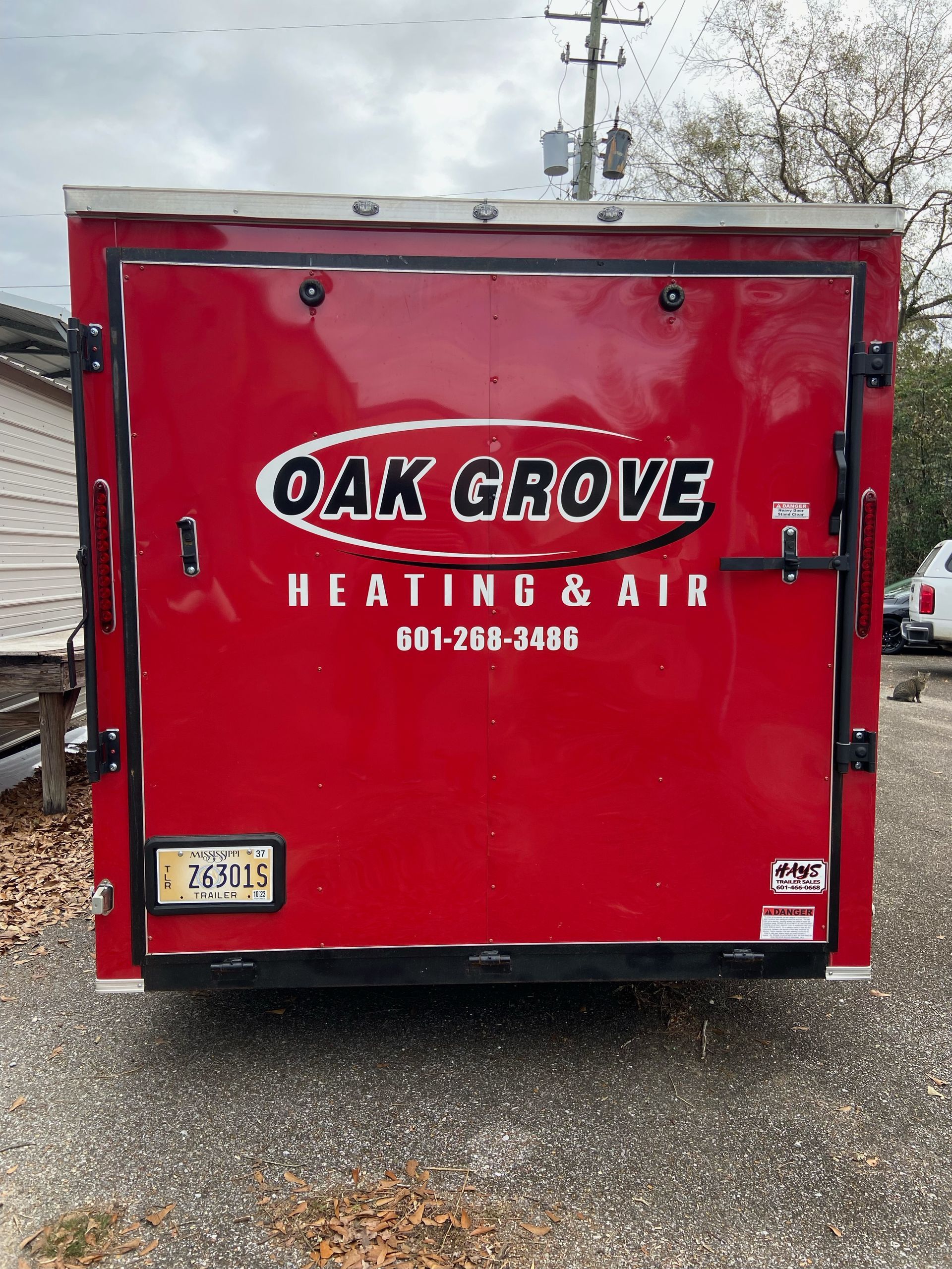 A red utility trailer with 