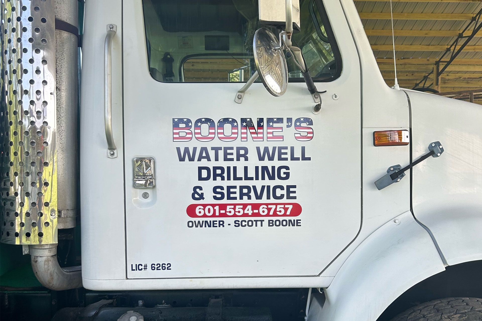White truck door labeled 
