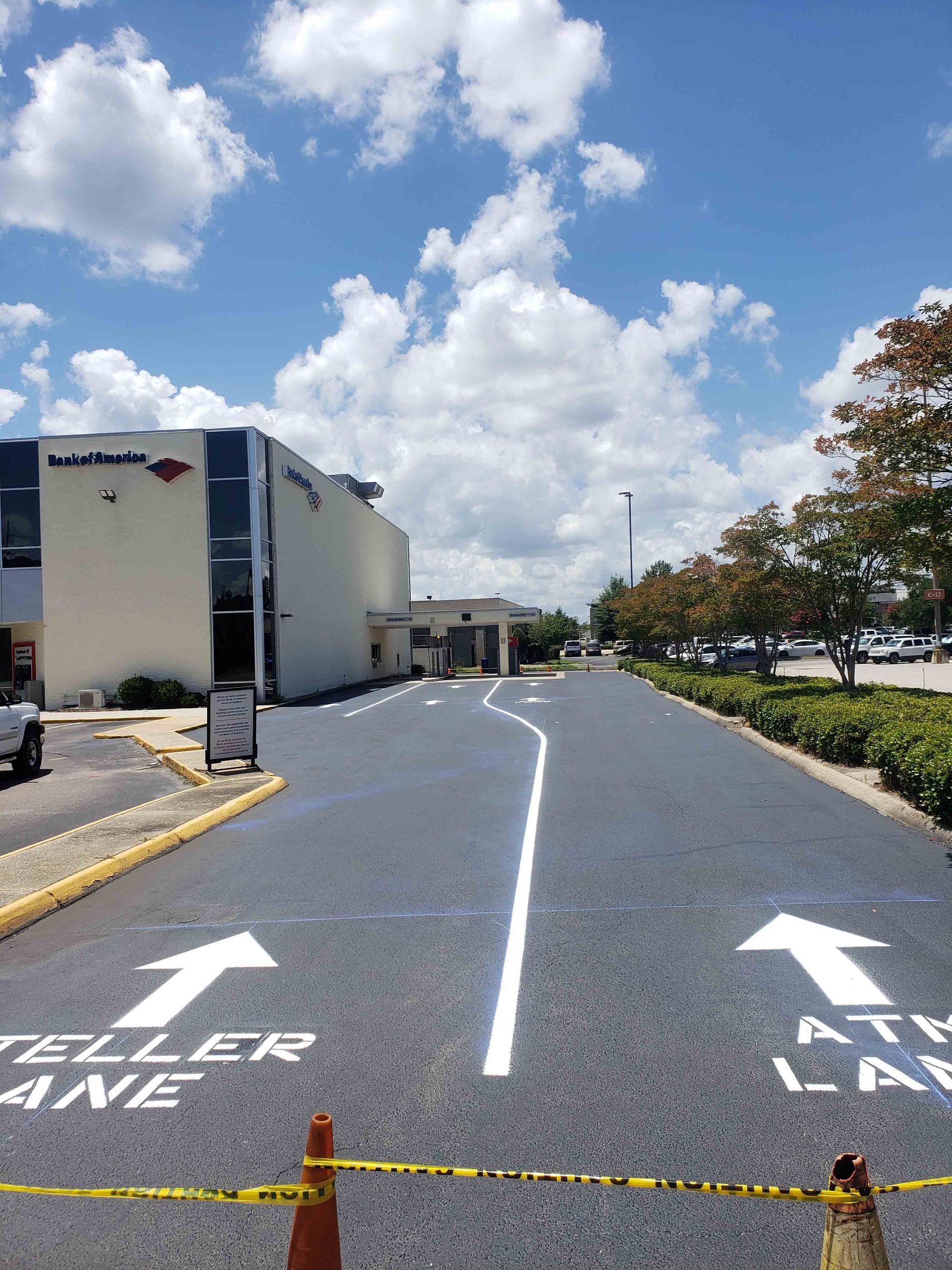 A teller lane is painted on the side of the road