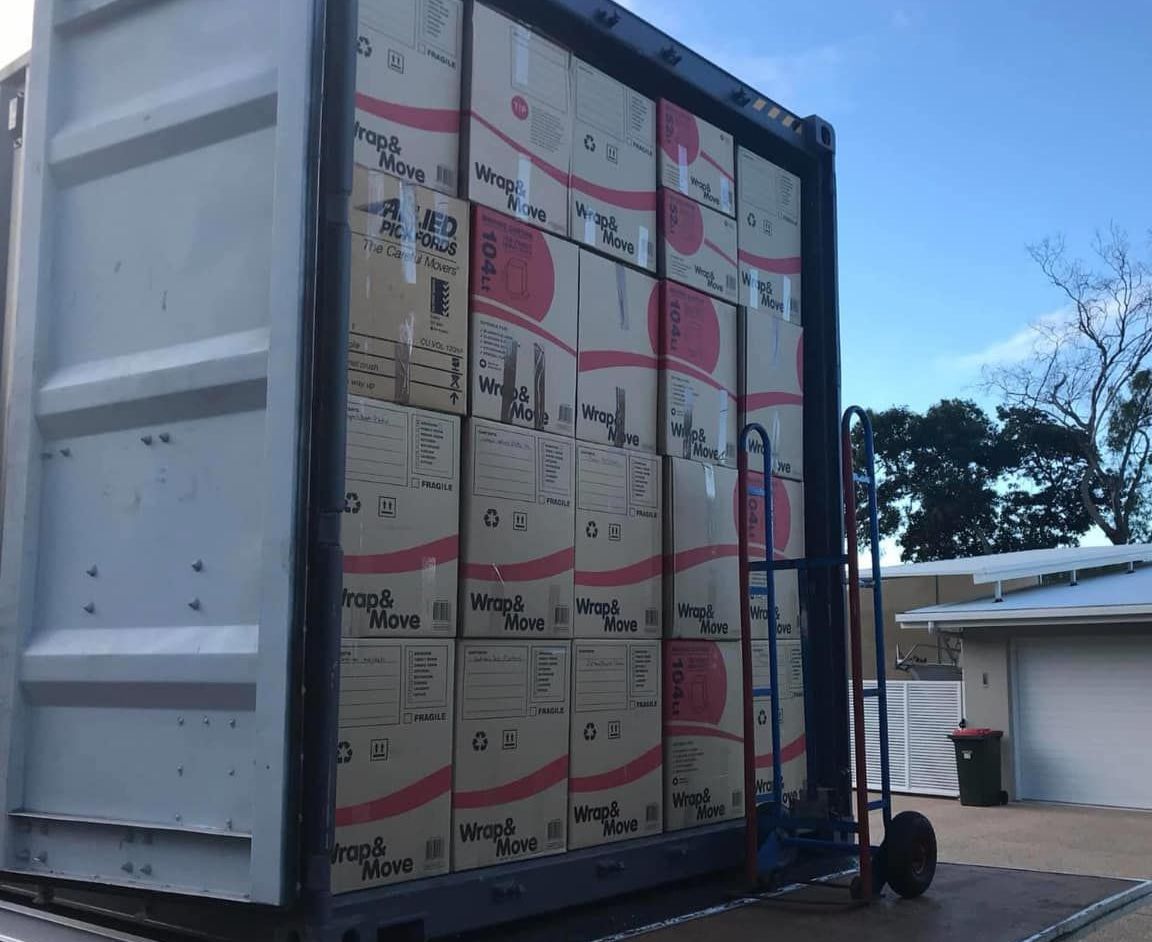 The Back of a Delivery Van is Filled With Cardboard Boxes — Roderick Removals & Van Lines In Gold Coast, NSW