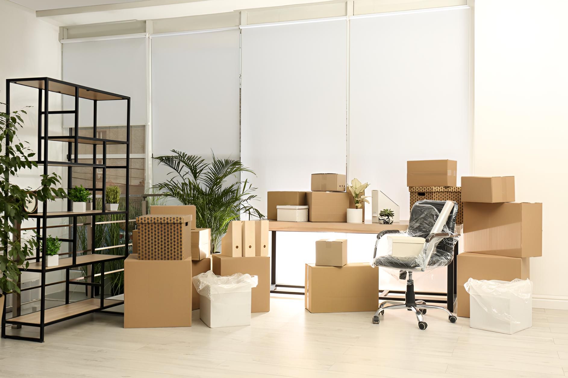 A Room Filled With Lots of Cardboard Boxes and Furniture — Roderick Removals & Van Lines In Tannum Sands, QLD