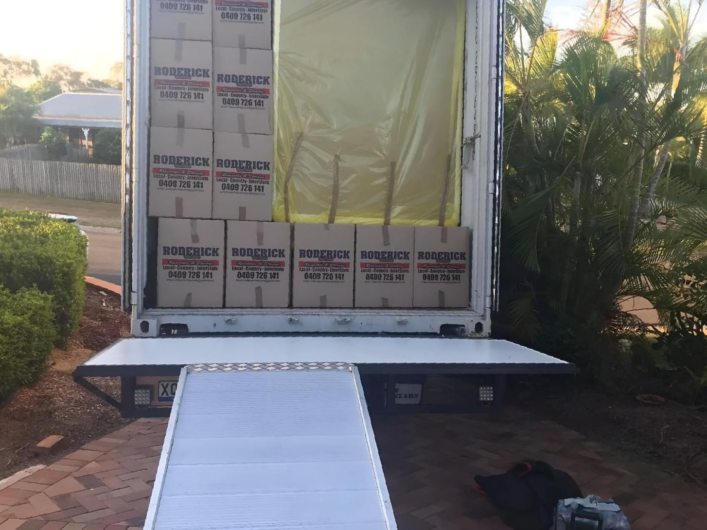 A Truck Filled With Lots of Cardboard Boxes — Roderick Removals & Van Lines In Moura, NSW