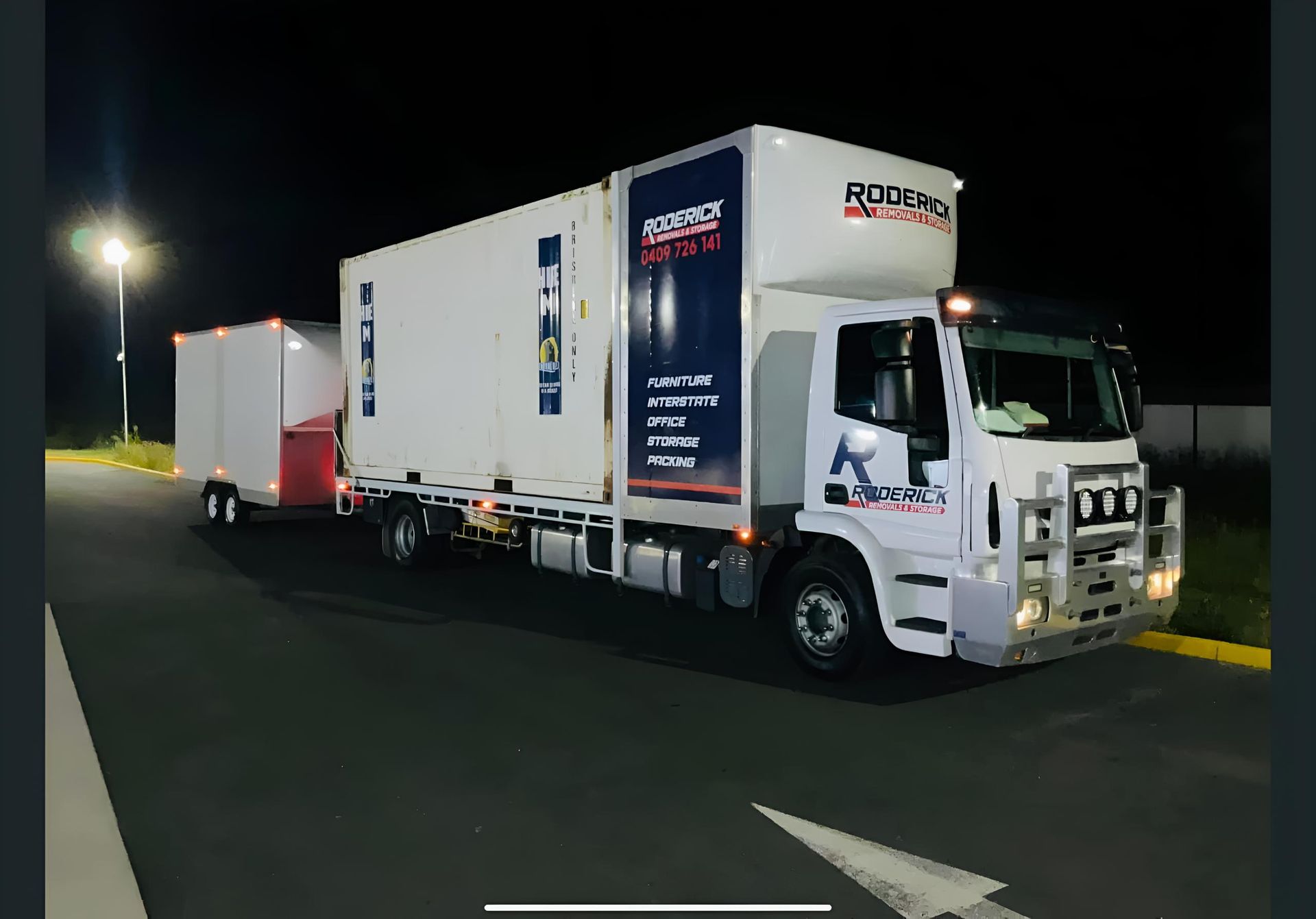 A removalist semi truck carrying a shipping container — Roderick Removals & Van Lines In Cairns, NSW