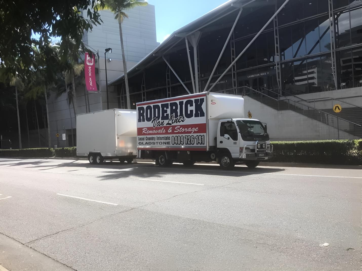 A Roderick Truck is Parked on the Side of the Road — Roderick Removals & Van Lines In Bowen, QLD