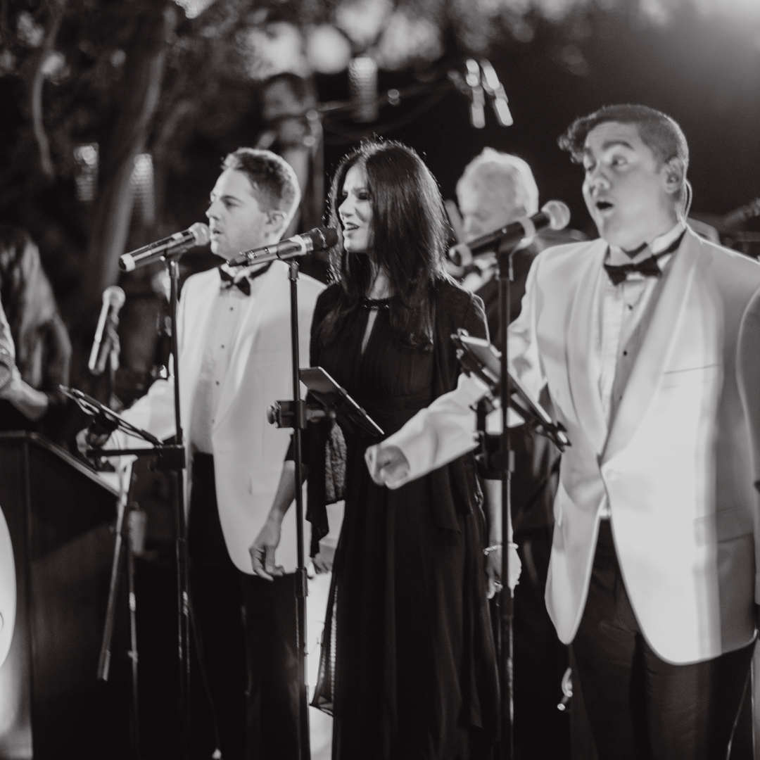 wedding singers performing in black and white