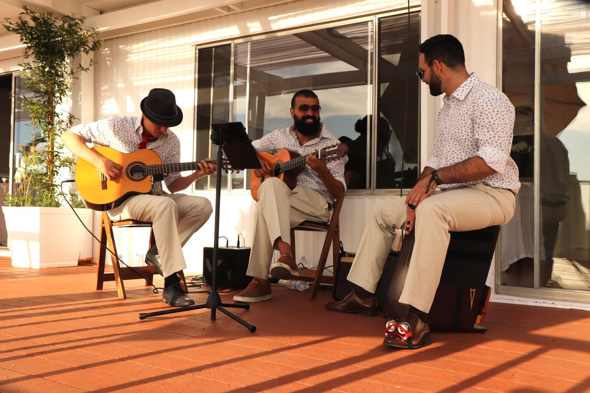 Latin Trio Guitarists playing music at outdoor private event