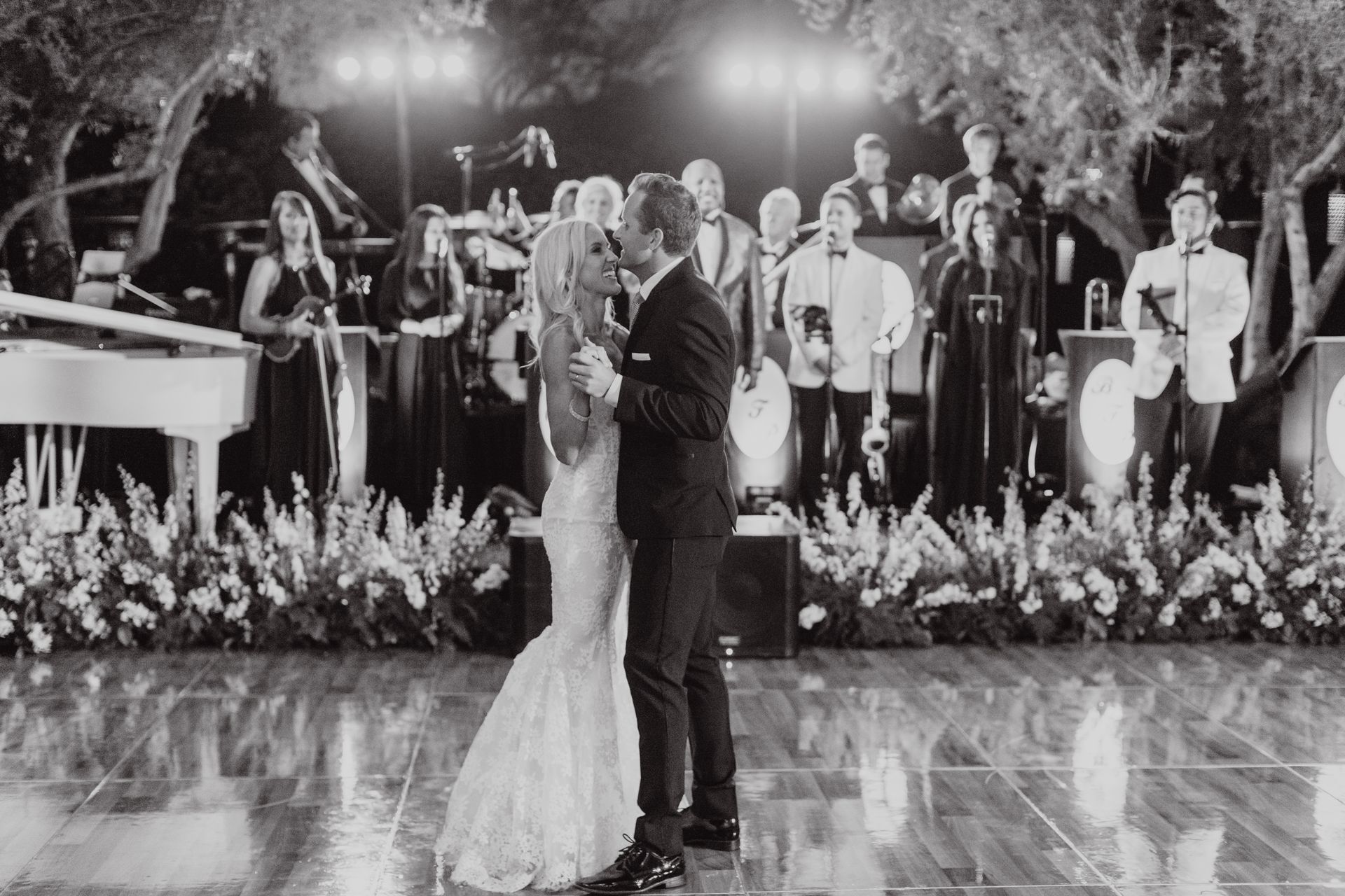 bride and groom first dance with live band