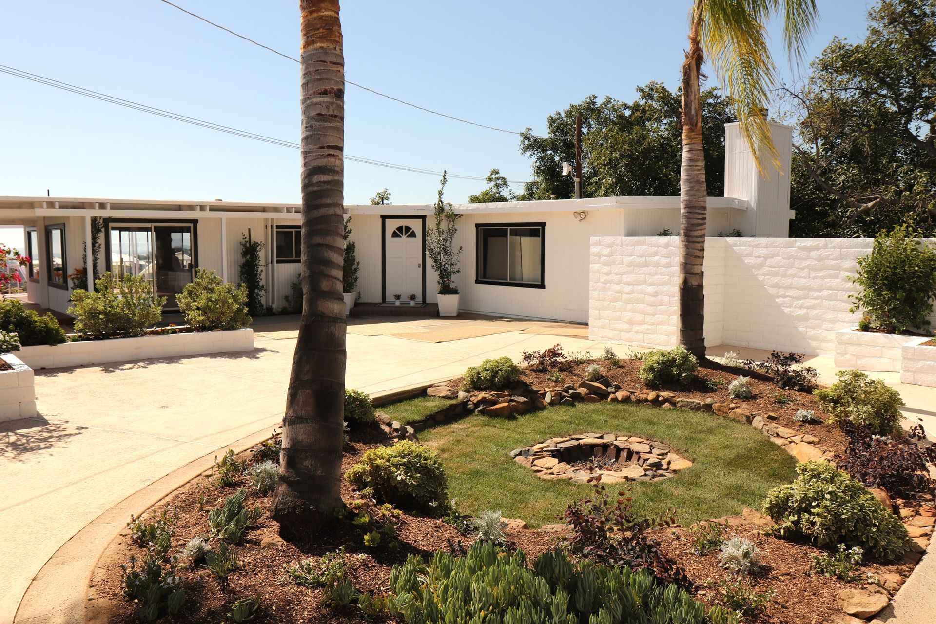 Front of farmhouse with new landscaping
