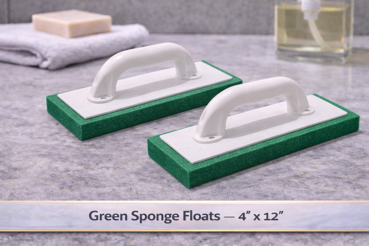 Green sponge floats with white handles on a gray surface, labeled “4” x 12”.”