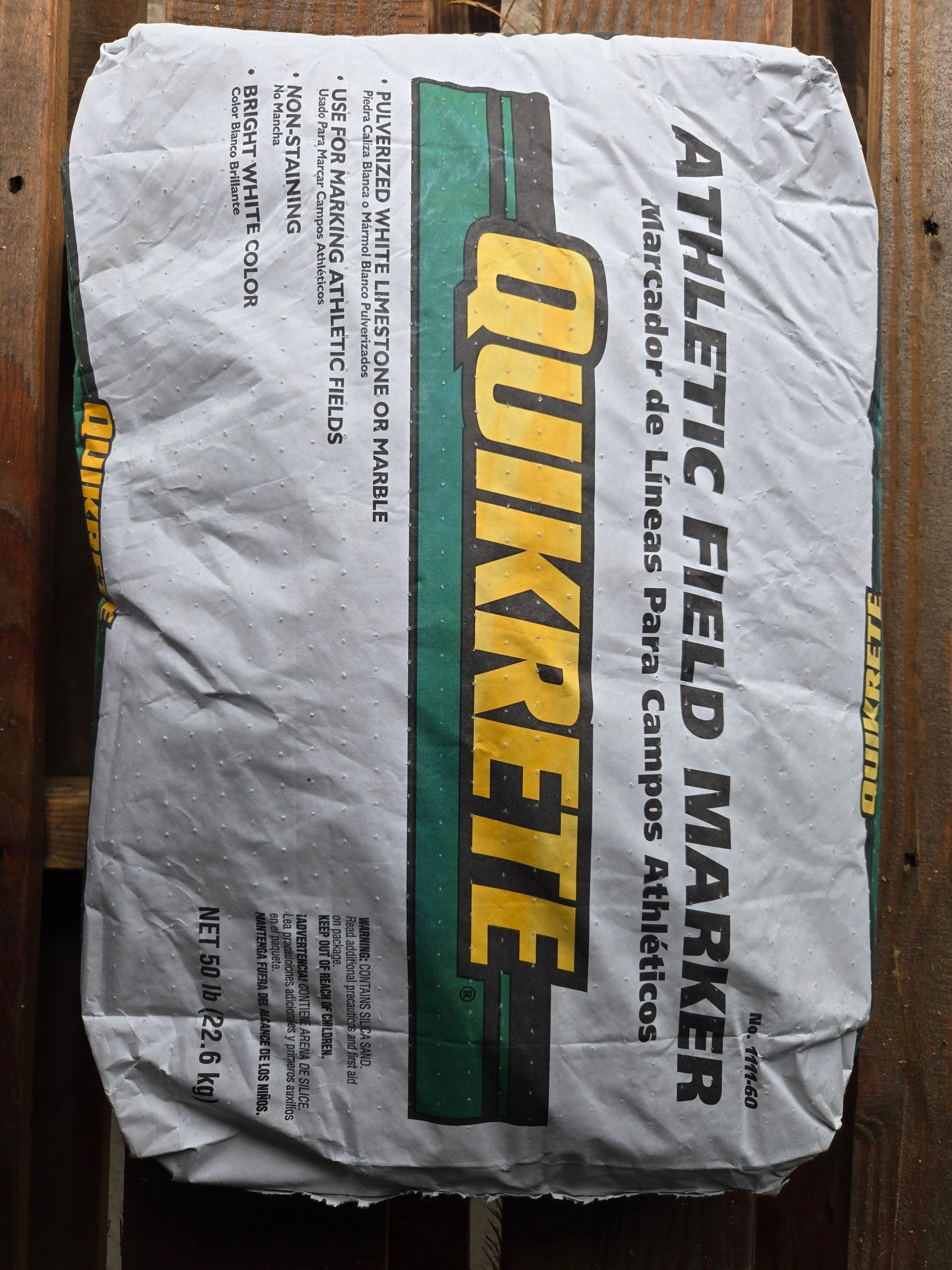 Bag of Quikrete Tile, Grout and Mortar Mix on a white background