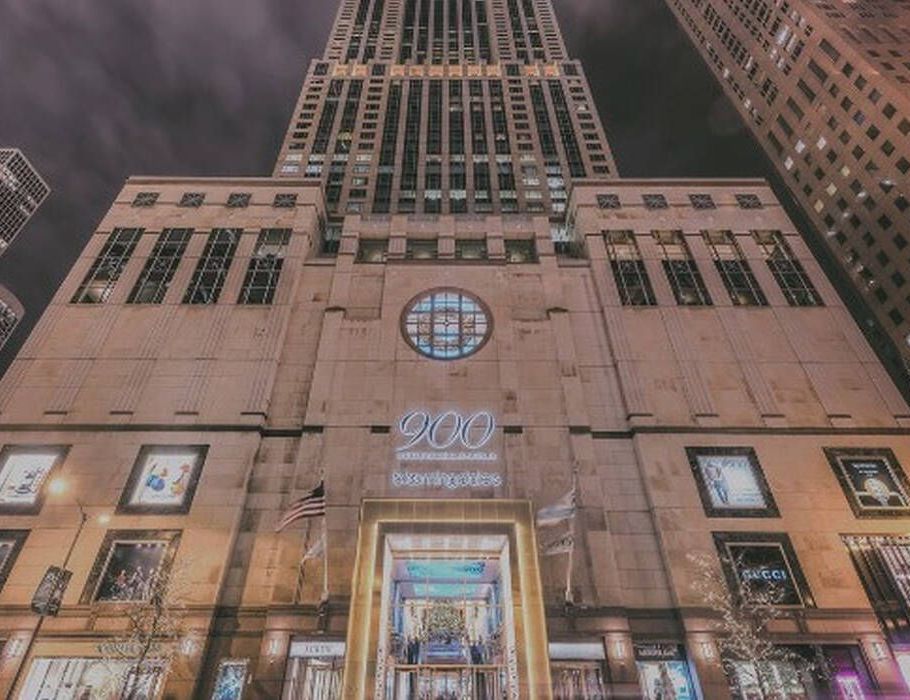 Looking up at the empire state building at night