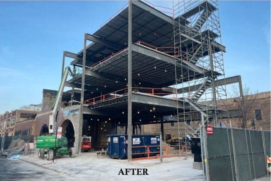 A picture of a building under construction with the caption after