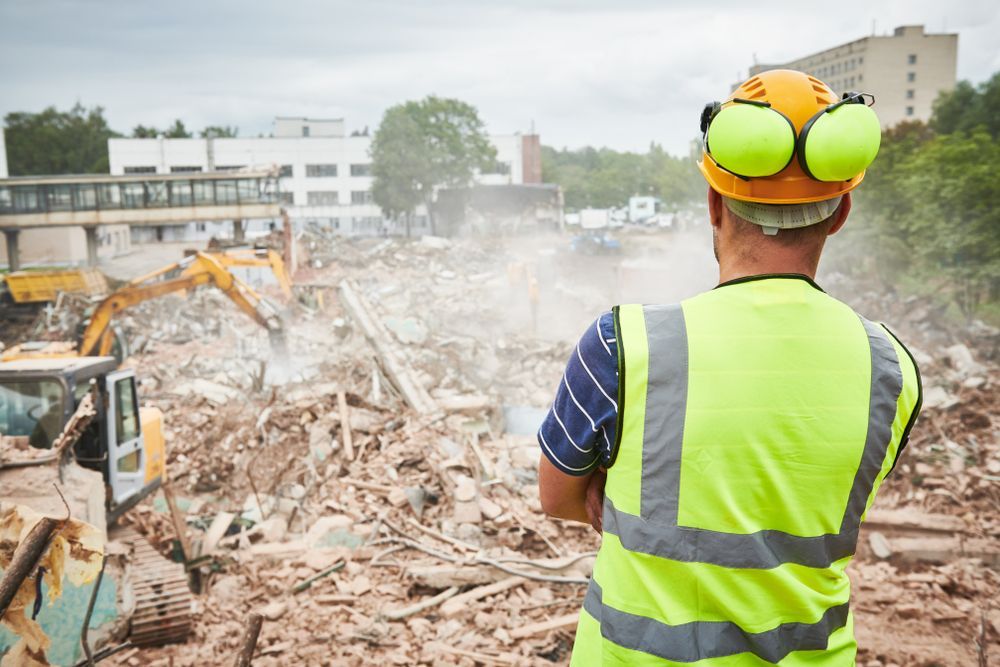 Alpine Demolition supervisor monitoring demolition site to support daily safety coordination and project oversight