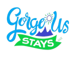 Blue and green “Gorgeous Stays LLC” logo with a sun over mountains and a green banner
