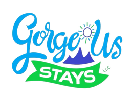 Gorgeous Stays logo in blue and green with a sun over mountains