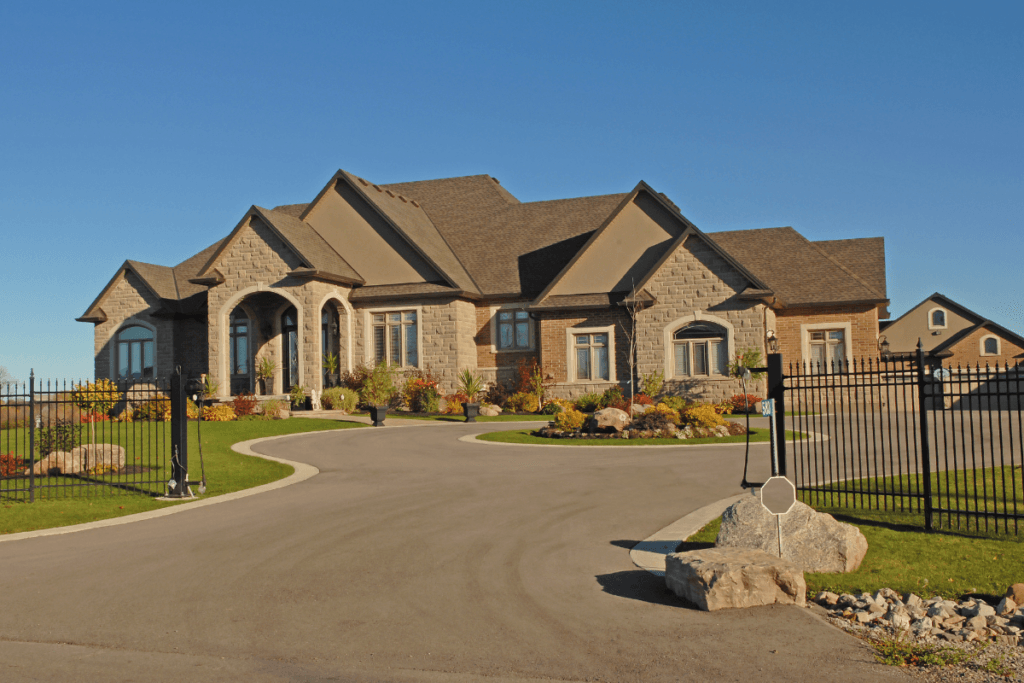 A large house with a driveway leading to it